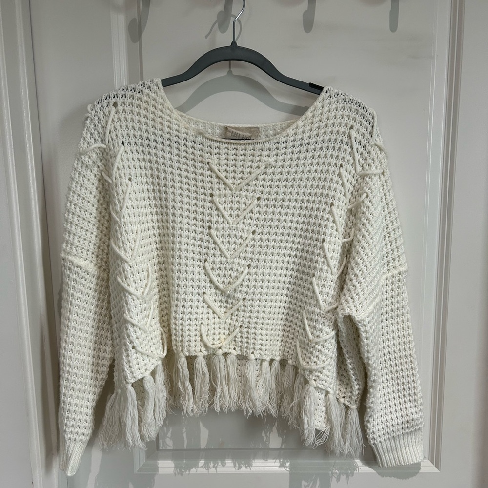 White knit sweater with fringe